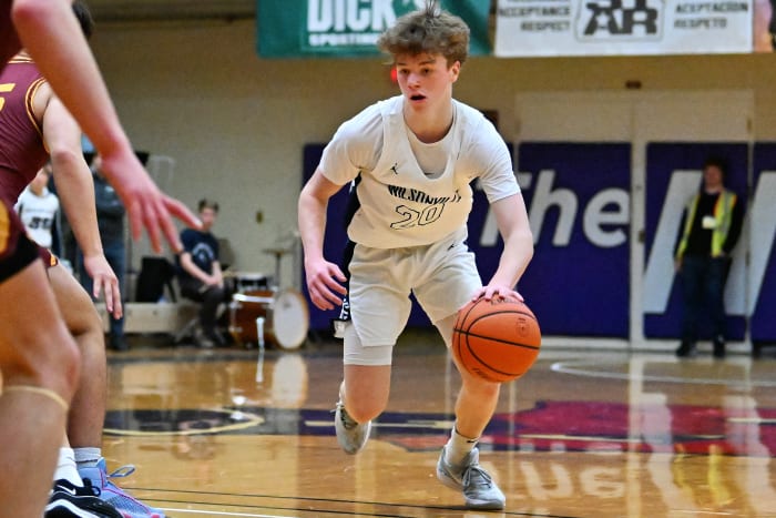 a Wilsonville Redmond 5A Oregon boys basketball quarterfinal 2024 Leon Neuschwander 24